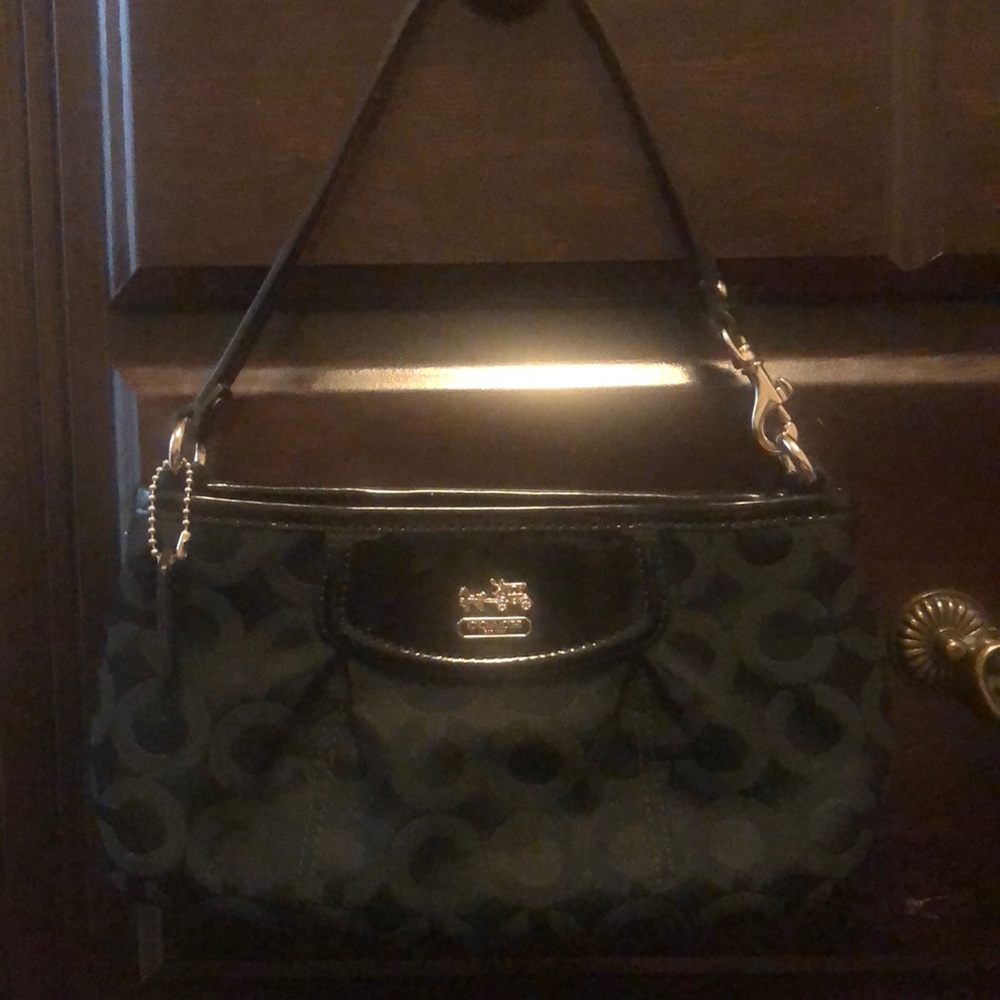 Coach mini purse that can also be used into a clutch